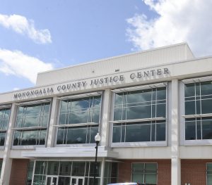 Mon Commission seeks savings through justice center refinancing